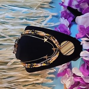 3 necklaces and 1 bracelet Vintage Costume Jewelry.